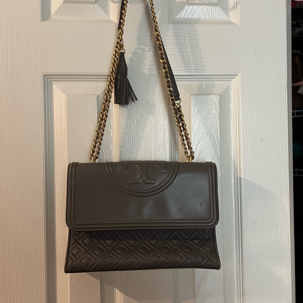 Tan adjustable strap shoulder quilted Tory Burch Bag with tassel